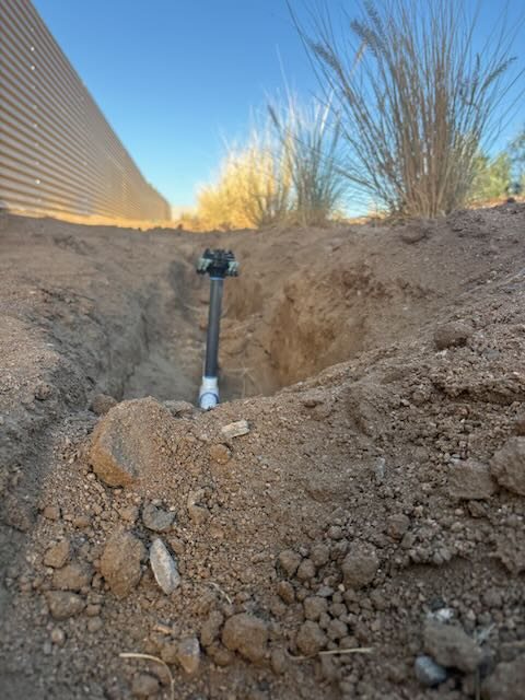 Irrigation supply line trenched across the property